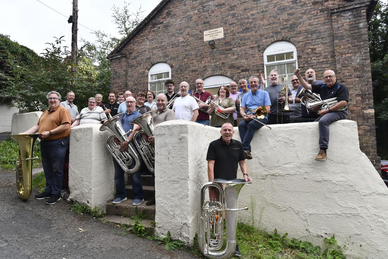 Jackfield Band outside a historic chapel
